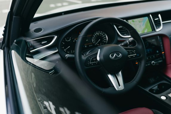 Modern car interior with leather seats and navigation screen